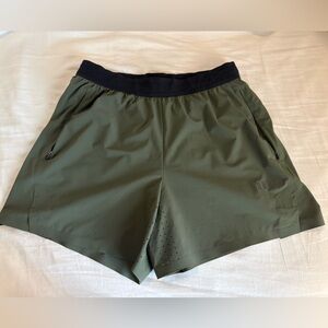Nobull Men’s medium 6 inch unlined training shorts green